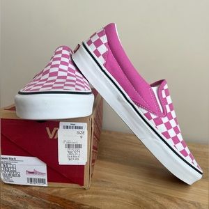 Women’s pink slip on checkered Vans
